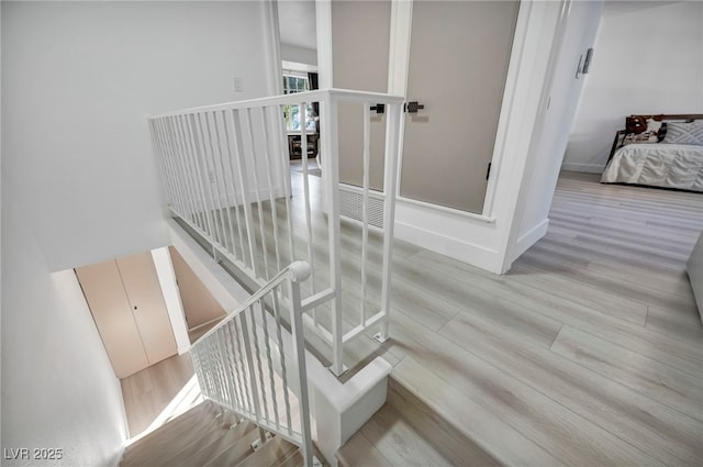 882 Tam O Shanter, Las Vegas, NV 89109 - stairs with wood finished floors and baseboards