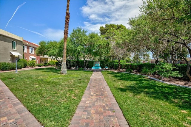 572 Tam O Shanter, Las Vegas, NV 89109 - surrounding community with a lawn