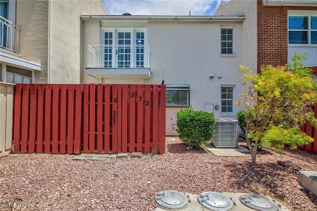 572 Tam O Shanter, Las Vegas, NV 89109 - view of side of property featuring brick siding and a central air condition unit