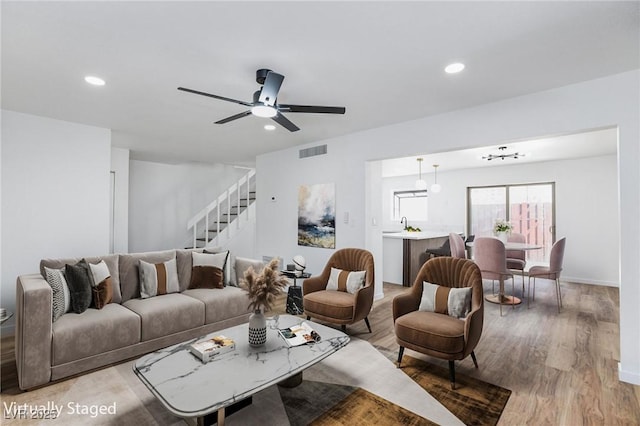 572 Tam O Shanter, Las Vegas, NV 89109 - living area with stairway, recessed lighting, light wood-style floors, and a ceiling fan