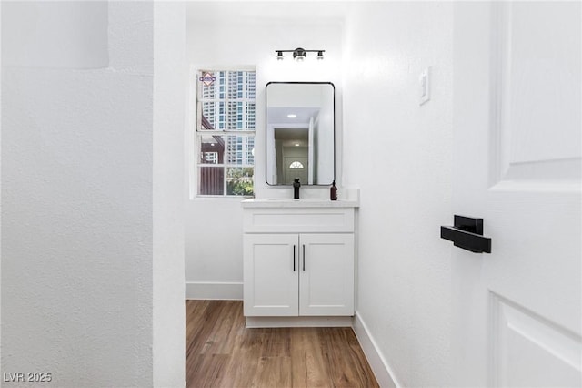 572 Tam O Shanter, Las Vegas, NV 89109 - bathroom featuring vanity and wood finished floors