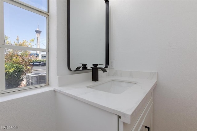 572 Tam O Shanter, Las Vegas, NV 89109 - bathroom view of vanity and a textured wall