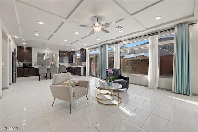 6618 Tangled Vines Ave, Las Vegas, NV 89139 - living area featuring coffered ceiling, light tile patterned floors, a ceiling fan, recessed lighting, and beam ceiling