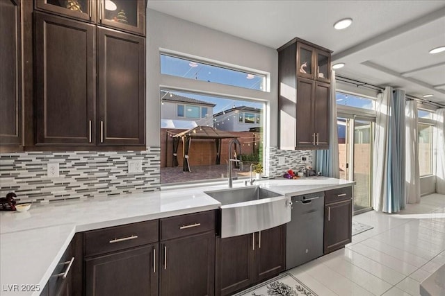 6618 Tangled Vines Ave, Las Vegas, NV 89139 - kitchen featuring dishwasher, plenty of natural light, dark brown cabinetry, and recessed lighting
