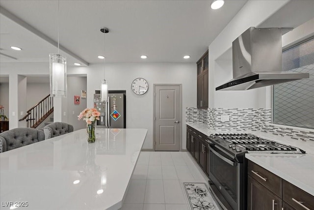 6618 Tangled Vines Ave, Las Vegas, NV 89139 - kitchen with black range with gas cooktop, island range hood, dark brown cabinets, light countertops, and recessed lighting