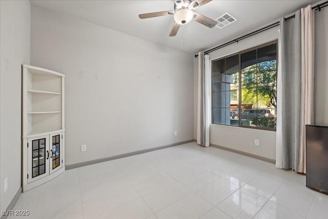 6618 Tangled Vines Ave, Las Vegas, NV 89139 - empty room featuring a ceiling fan and baseboards