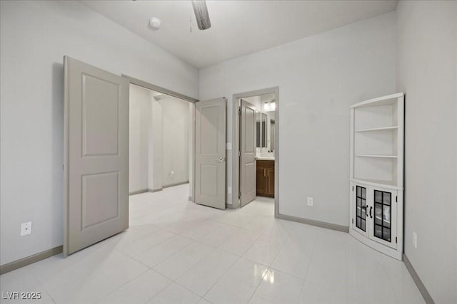 6618 Tangled Vines Ave, Las Vegas, NV 89139 - unfurnished bedroom with ensuite bath and ceiling fan