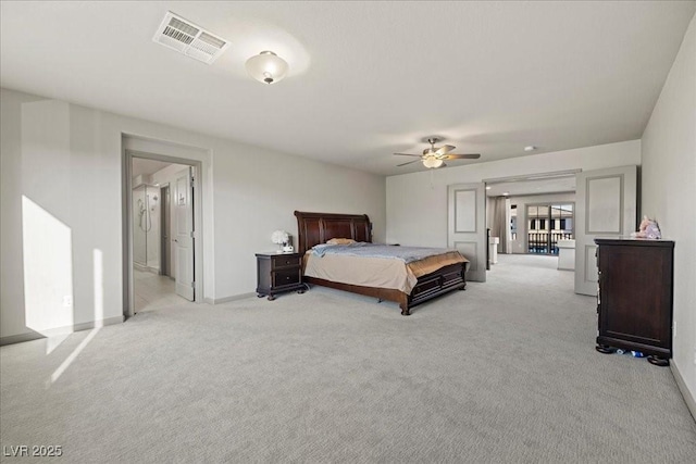 6618 Tangled Vines Ave, Las Vegas, NV 89139 - bedroom featuring light carpet, a ceiling fan, and connected bathroom