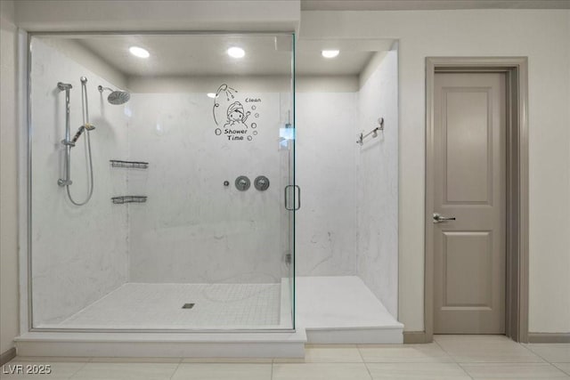6618 Tangled Vines Ave, Las Vegas, NV 89139 - bathroom featuring a marble finish shower and tile patterned flooring