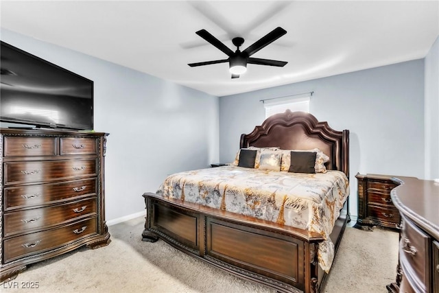 6953 Midnight Bronze St, North Las Vegas, NV 89086 - bedroom with light colored carpet and a ceiling fan