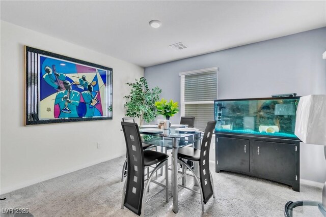 6953 Midnight Bronze St, North Las Vegas, NV 89086 - carpeted dining space featuring baseboards