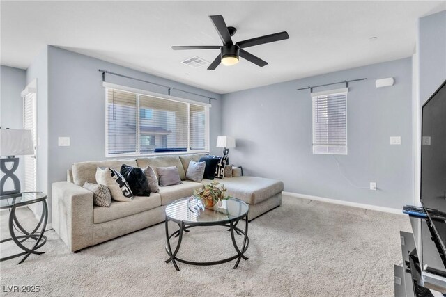 6953 Midnight Bronze St, North Las Vegas, NV 89086 - living area featuring carpet flooring and ceiling fan