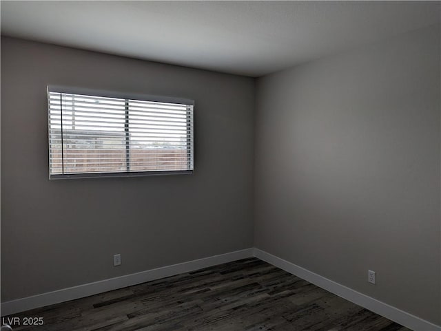 1220 Toledo St, Henderson, NV 89015 - unfurnished room featuring dark wood-type flooring and baseboards