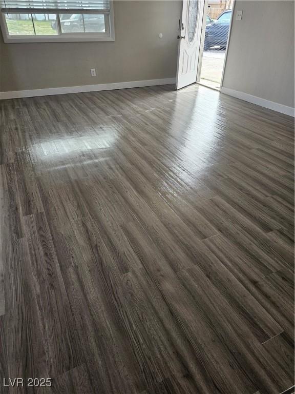 1220 Toledo St, Henderson, NV 89015 - empty room with dark wood-style floors
