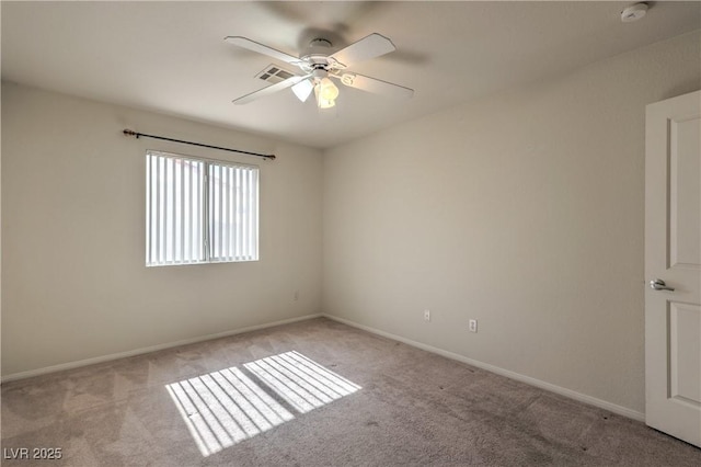 5425 Thomaston Ct, Las Vegas, NV 89122 - carpeted empty room with a smoke detector and a ceiling fan