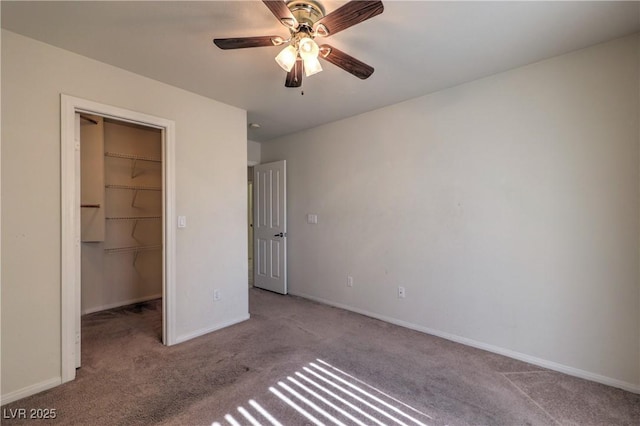 5425 Thomaston Ct, Las Vegas, NV 89122 - unfurnished bedroom with carpet floors, a spacious closet, a closet, and ceiling fan