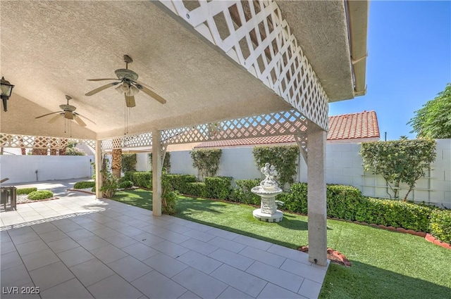 5425 Thomaston Ct, Las Vegas, NV 89122 - fenced backyard featuring a patio area and ceiling fan