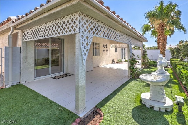 5425 Thomaston Ct, Las Vegas, NV 89122 - rear view of property with a patio area, stucco siding, and a tile roof