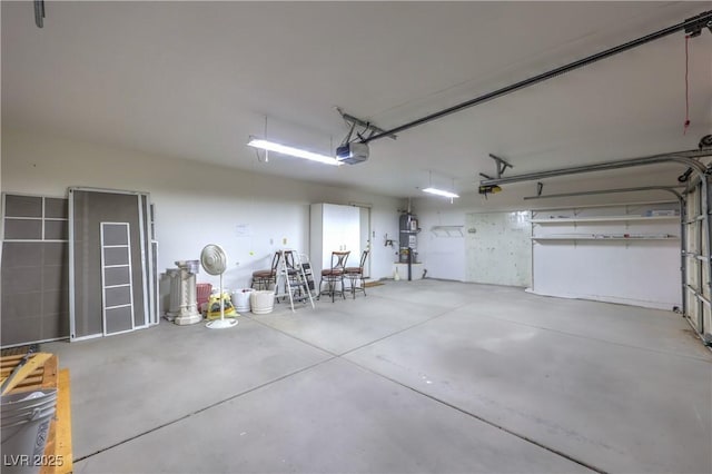 5425 Thomaston Ct, Las Vegas, NV 89122 - garage featuring a garage door opener and water heater