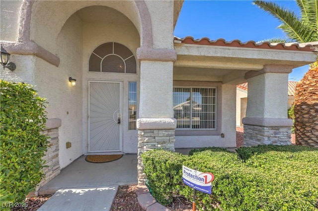 5425 Thomaston Ct, Las Vegas, NV 89122 - view of exterior entry with stucco siding and stone siding