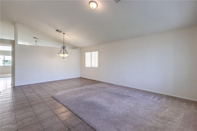5425 Thomaston Ct, Las Vegas, NV 89122 - tiled empty room featuring lofted ceiling and baseboards