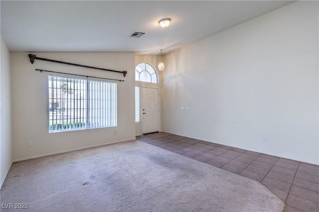 5425 Thomaston Ct, Las Vegas, NV 89122 - carpeted foyer entrance with plenty of natural light, vaulted ceiling, and tile patterned floors