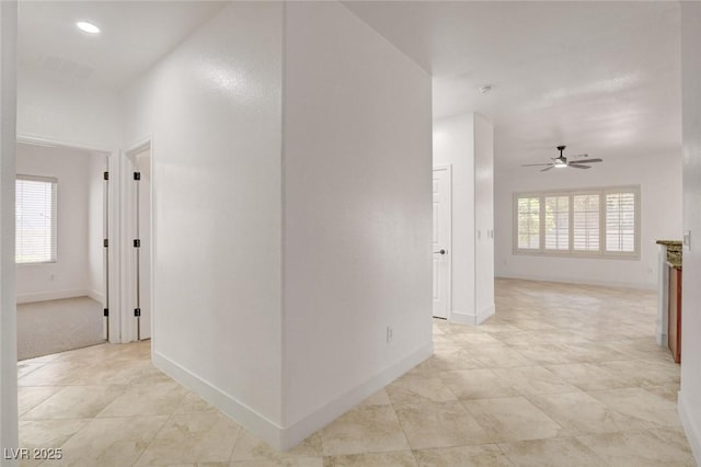 2149 Kelsey Creek Ct, Henderson, NV 89044 - corridor featuring healthy amount of natural light, light tile patterned floors, and recessed lighting