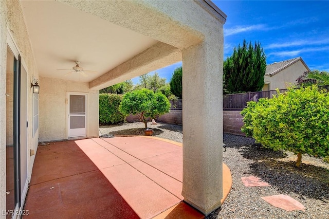 2149 Kelsey Creek Ct, Henderson, NV 89044 - fenced backyard with ceiling fan and a patio area