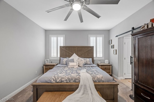 145 Langley Hill Ave, Henderson, NV 89002 - carpeted bedroom with multiple windows, a barn door, and a ceiling fan