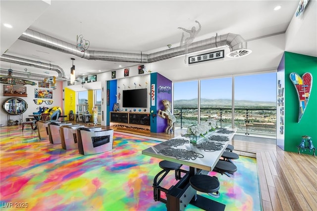 200 Hoover Ave Unit 1813, Las Vegas, NV 89101 - rec room with wood-type flooring, expansive windows, and recessed lighting