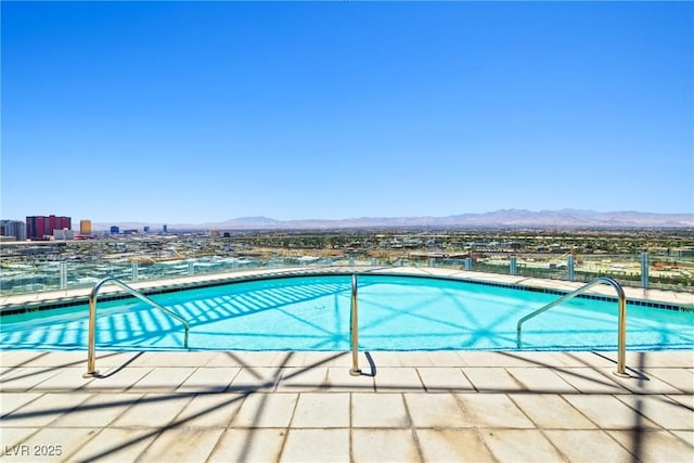 200 Hoover Ave Unit 1813, Las Vegas, NV 89101 - community pool featuring a mountain view