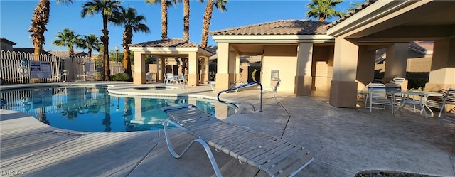 7395 Howell Mill Ct, Las Vegas, NV 89113 - community pool with a patio and a hot tub