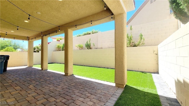145 Forest Crossing Ct, Las Vegas, NV 89148 - fenced backyard with a patio