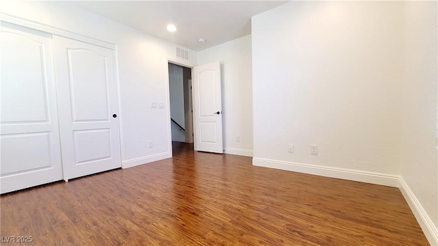 145 Forest Crossing Ct, Las Vegas, NV 89148 - unfurnished bedroom with wood finished floors, recessed lighting, and a closet