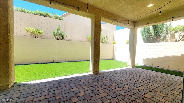 145 Forest Crossing Ct, Las Vegas, NV 89148 - fenced backyard with a patio area