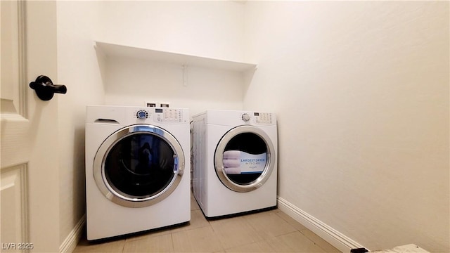 145 Forest Crossing Ct, Las Vegas, NV 89148 - laundry room featuring washing machine and dryer and baseboards
