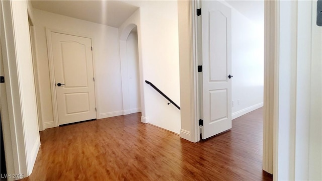 145 Forest Crossing Ct, Las Vegas, NV 89148 - corridor featuring an upstairs landing and wood finished floors
