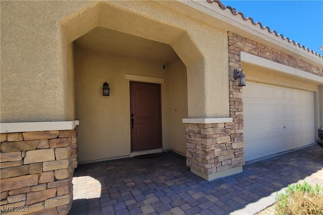 145 Forest Crossing Ct, Las Vegas, NV 89148 - property entrance featuring stucco siding and stone siding