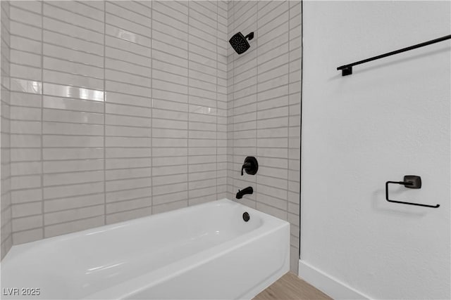1108 Putnam Ave, North Las Vegas, NV 89030 - bathroom featuring shower / bath combination and wood finished floors