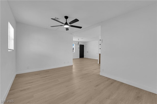 1108 Putnam Ave, North Las Vegas, NV 89030 - spare room featuring ceiling fan, healthy amount of natural light, and light wood-style flooring
