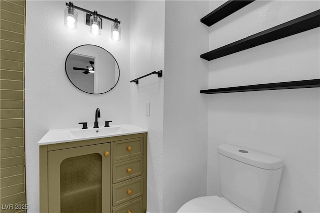 1108 Putnam Ave, North Las Vegas, NV 89030 - bathroom featuring a ceiling fan and vanity