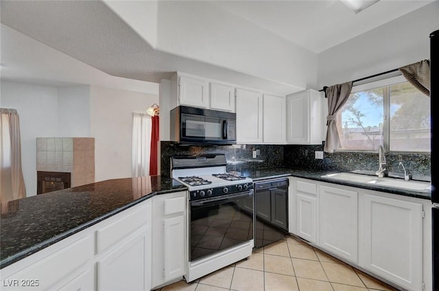 900 Heavenly Hills Ct Unit 114, Las Vegas, NV 89145 - kitchen with black appliances, decorative backsplash, white cabinetry, light tile patterned flooring, and dark stone countertops