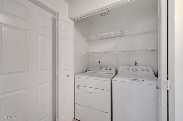 900 Heavenly Hills Ct Unit 114, Las Vegas, NV 89145 - laundry area with washing machine and clothes dryer