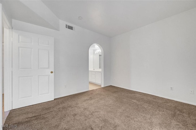900 Heavenly Hills Ct Unit 114, Las Vegas, NV 89145 - empty room with carpet floors and arched walkways