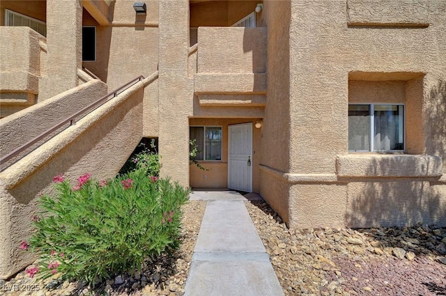 900 Heavenly Hills Ct Unit 114, Las Vegas, NV 89145 - doorway to property with stucco siding
