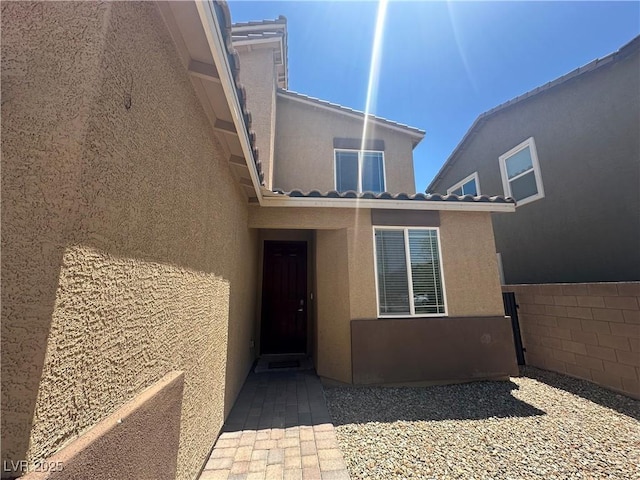 7636 Bandon Cliffs St, North Las Vegas, NV 89084 - doorway to property featuring stucco siding
