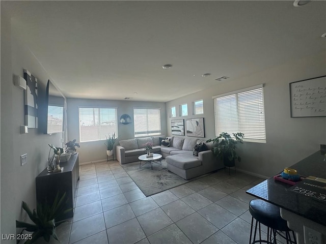 7636 Bandon Cliffs St, North Las Vegas, NV 89084 - living area featuring tile patterned floors and baseboards