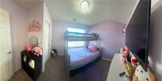 7636 Bandon Cliffs St, North Las Vegas, NV 89084 - carpeted bedroom with lofted ceiling and baseboards