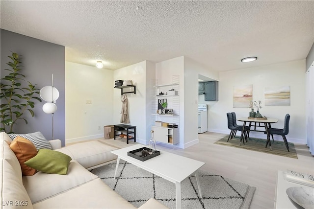 4683 Monterey Cir Unit 4, Las Vegas, NV 89169 - living room with a textured ceiling and light wood-style flooring
