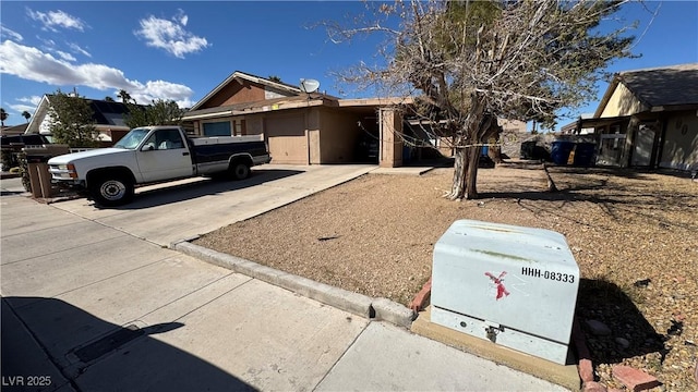 7056 Sprucewood St, Las Vegas, NV 89147 - ranch-style home with concrete driveway